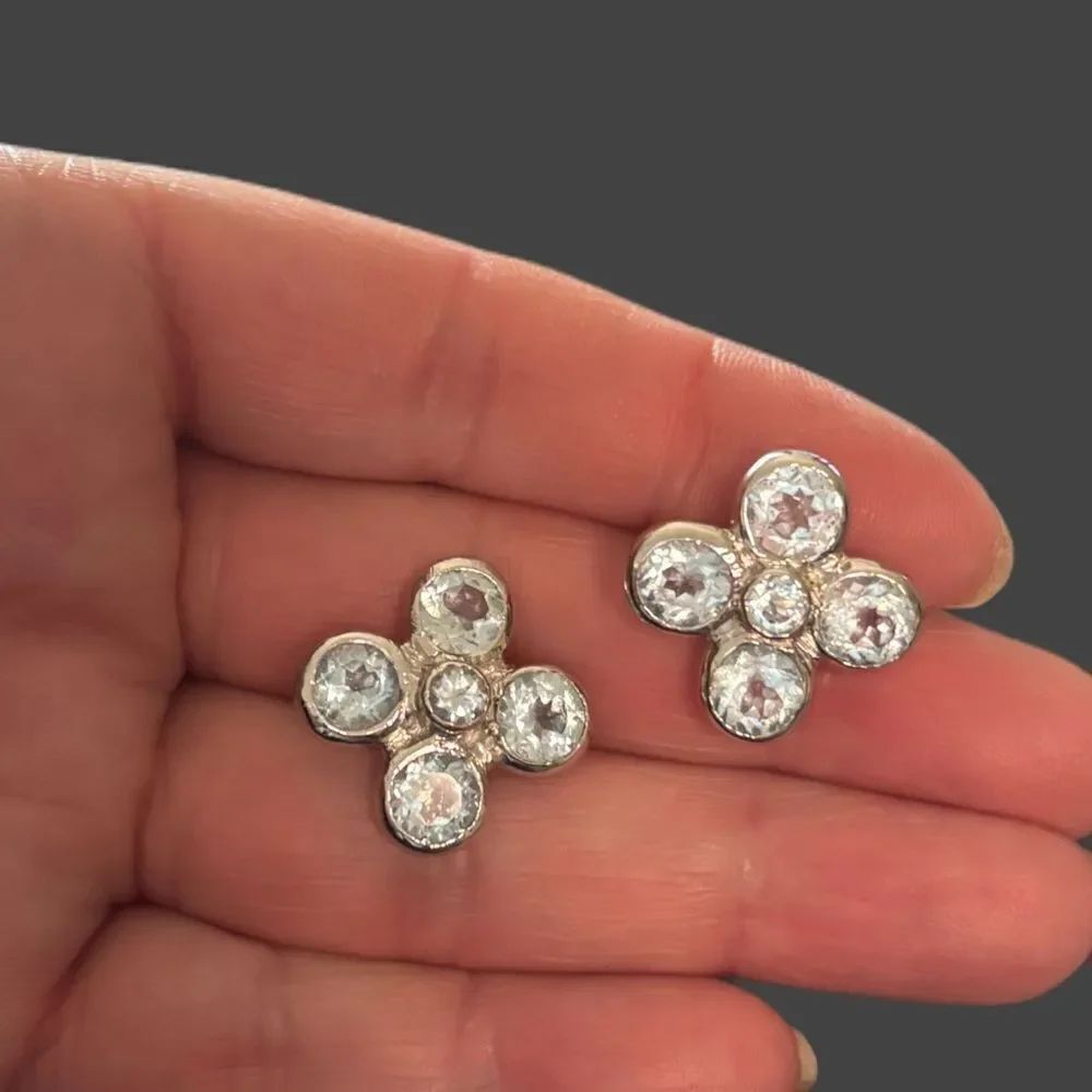 Vintage silver tone earrings with light blue stones